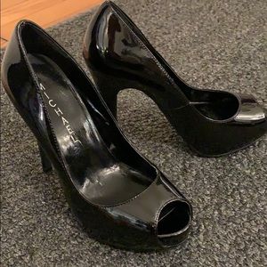 Shinny black leather,  size 5.5 heals